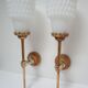 Pair of vintage patinated golden metal hand sconces