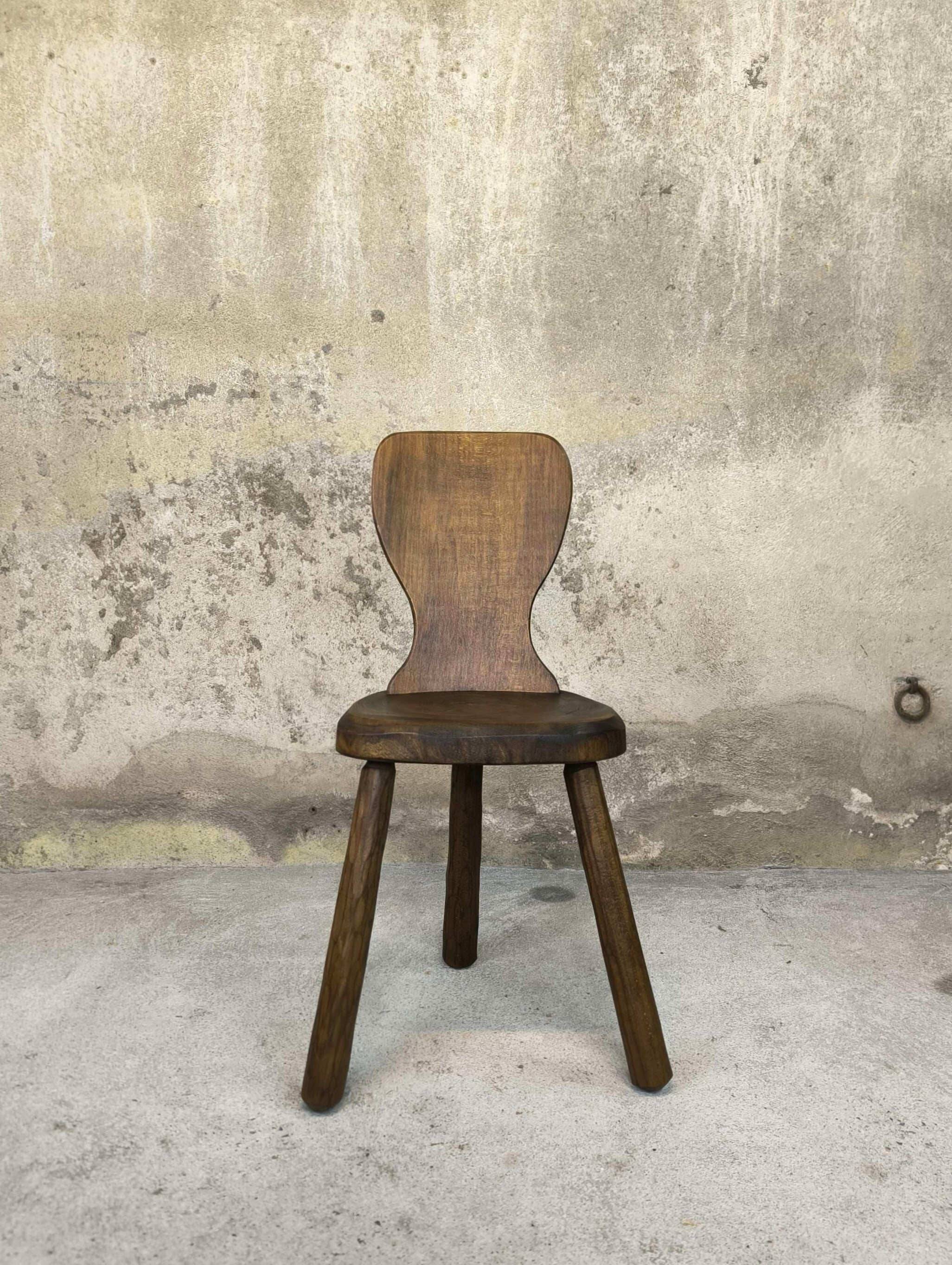Vintage tripod chair made of solid wood.