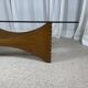 Sculptural coffee table in mahogany and glass – Europe, 1970s
