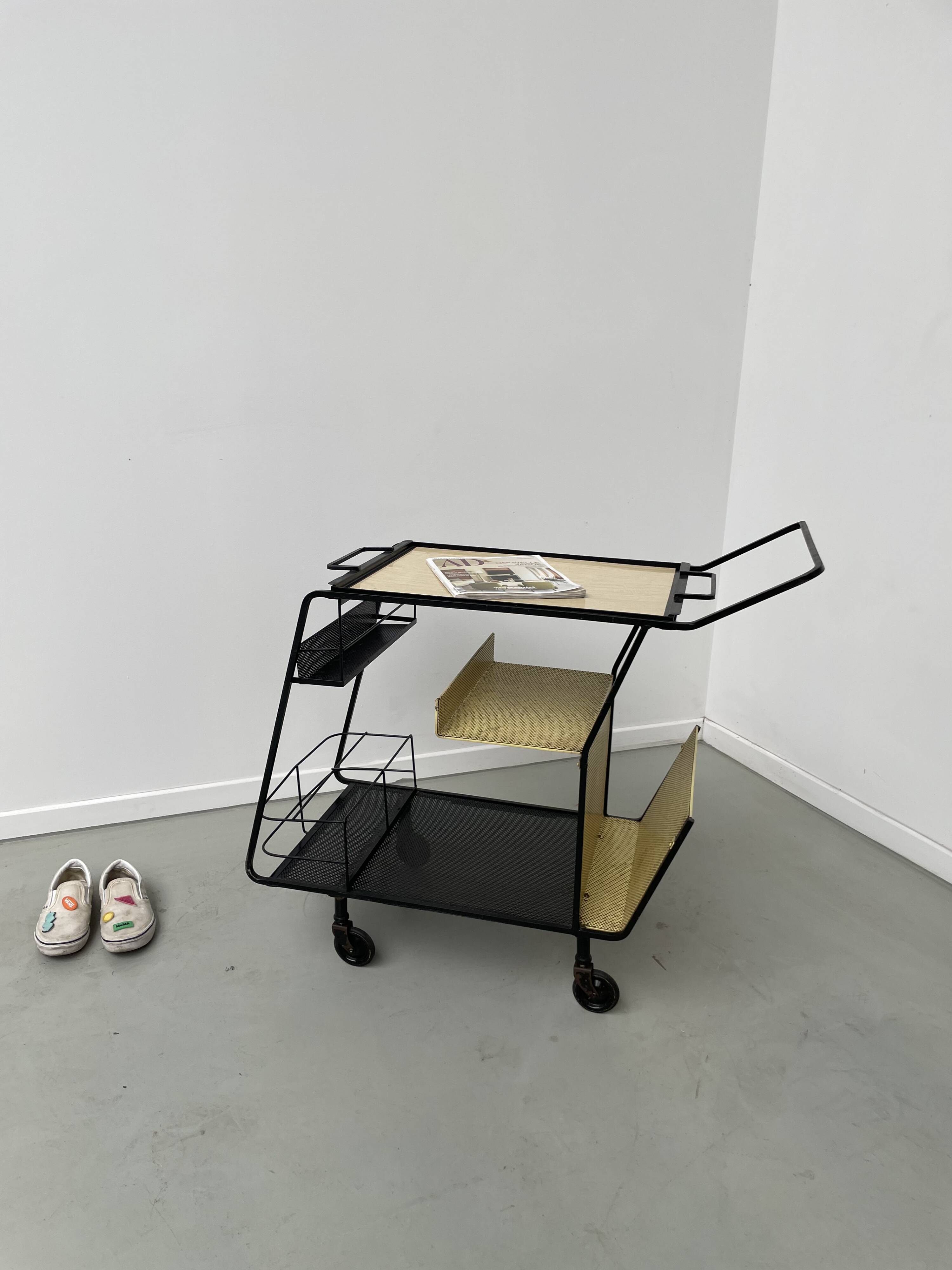 Perforated metal serving trolley in the Mathieu Matégot style