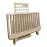 Baby cot with evolutionary bar