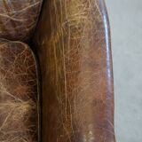 Grained cowhide armchair with a timeless design