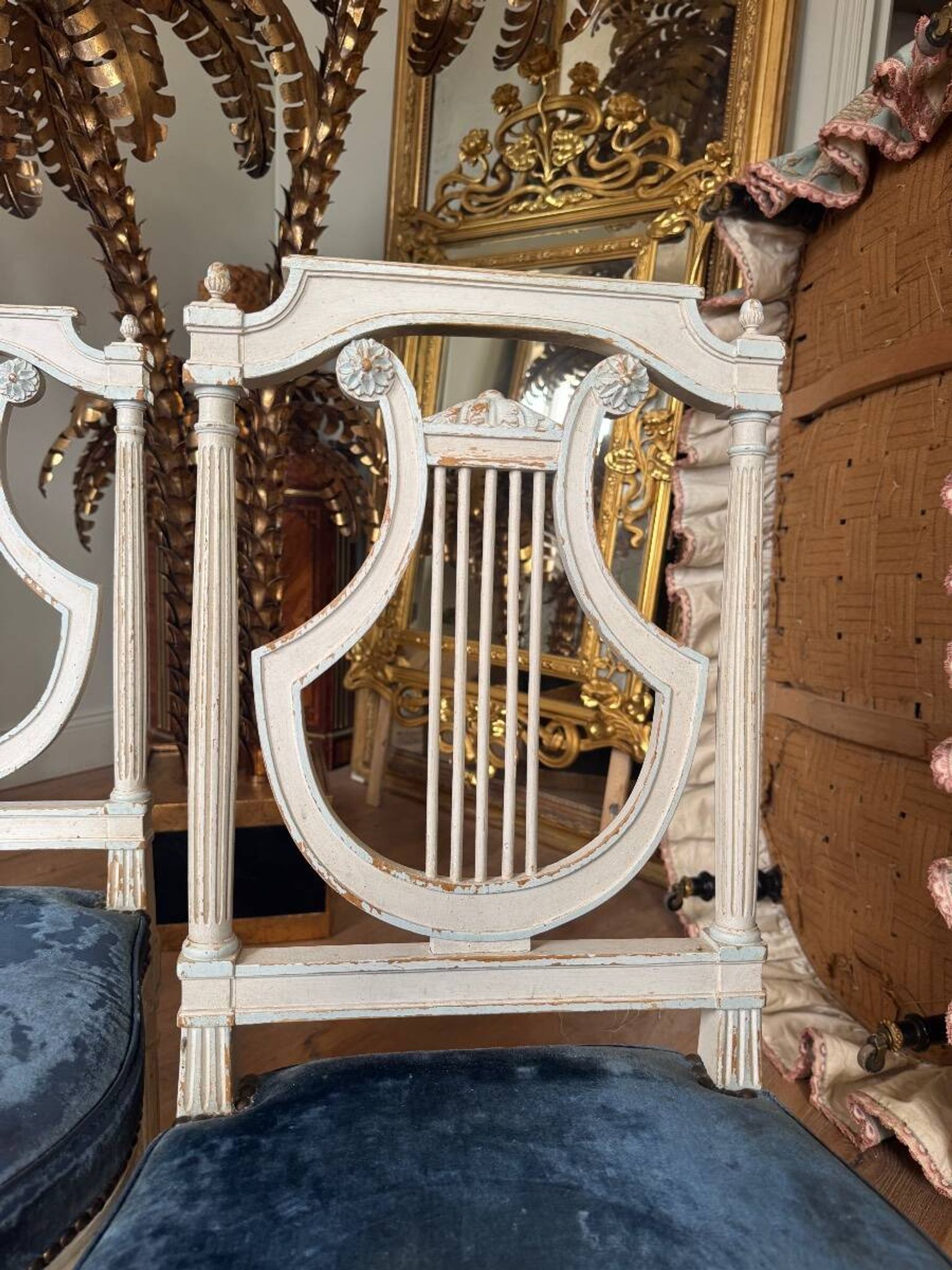 Set of 6 lyre chairs from the Napoleonic III period in painted wood in the Louis XVI style.
