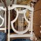 Set of 6 lyre chairs from the Napoleonic III period in painted wood in the Louis XVI style.