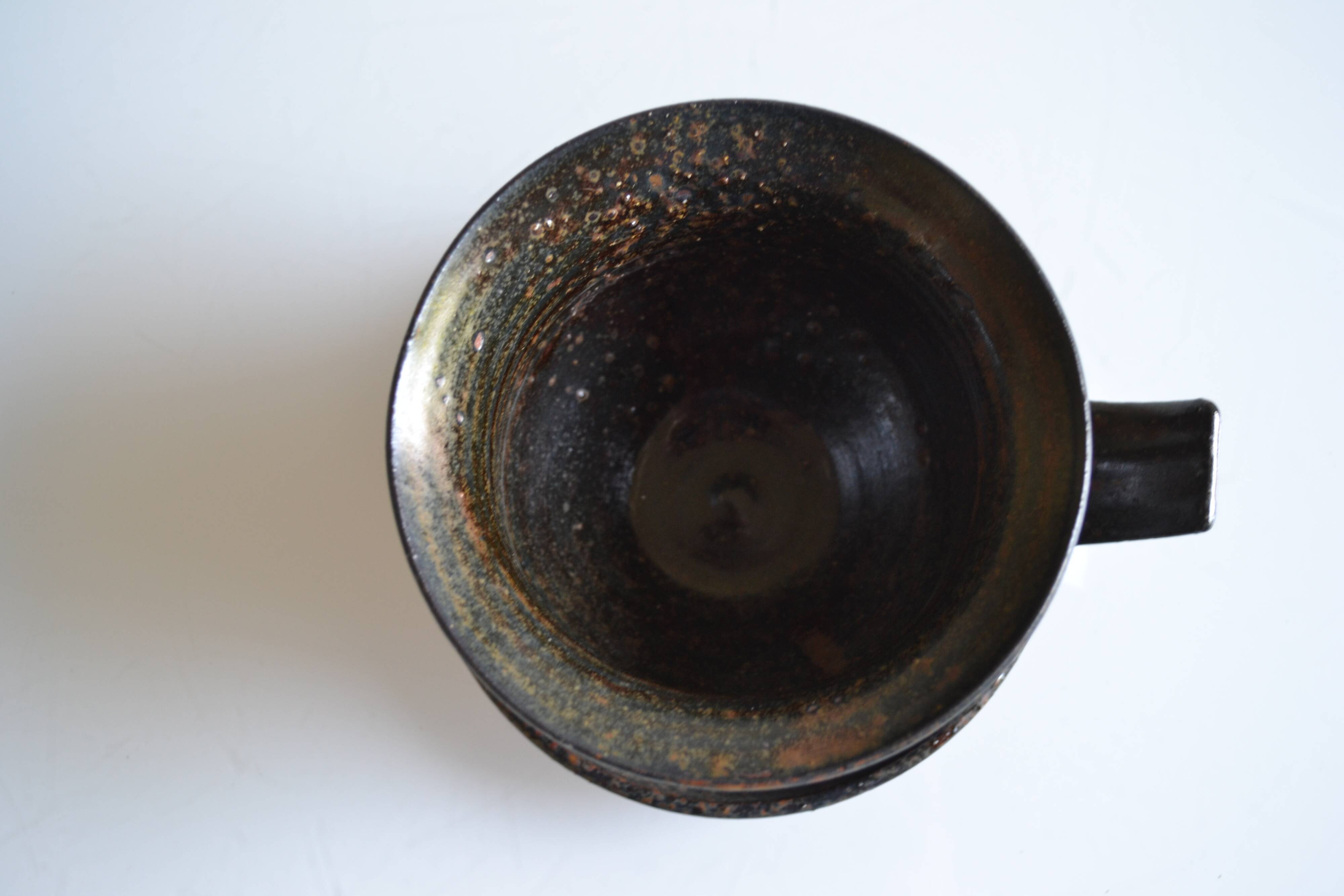 1970s ceramic cup and saucer signed