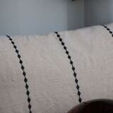 Embroidered linen cushion