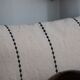 Embroidered linen cushion