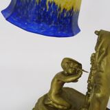 Vintage bronze table lamp featuring a painter on a mirror from the 1960s.