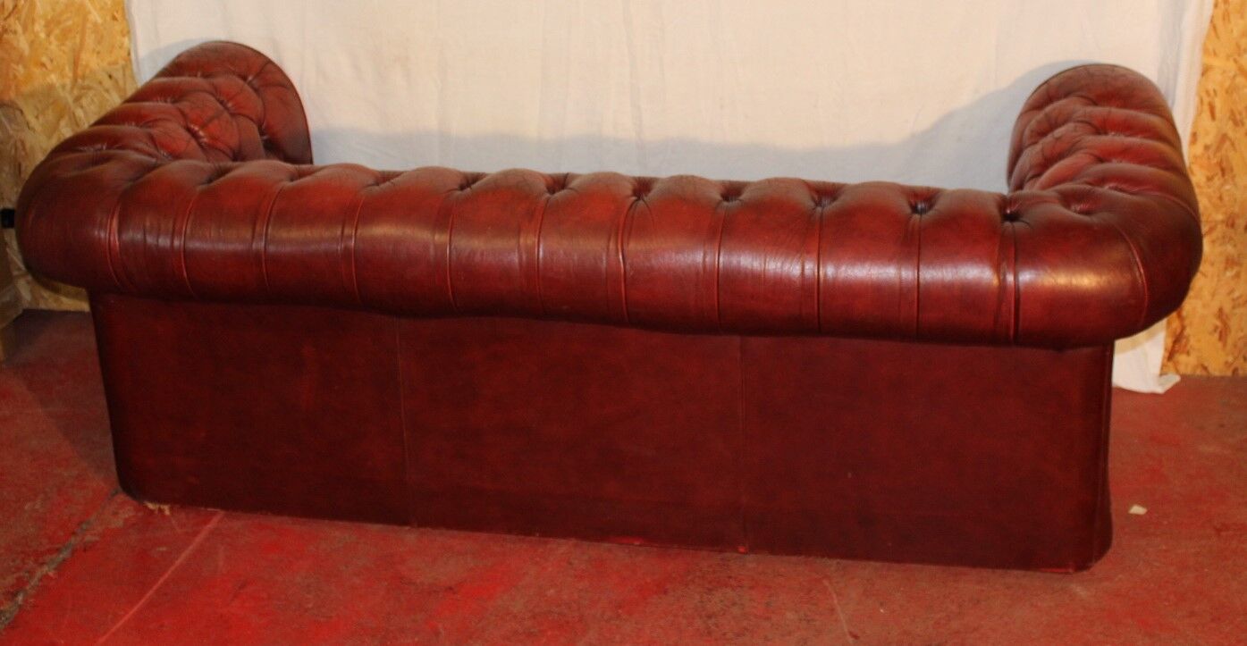 Red 3 x seater chesterfiel with Union Jack cushions