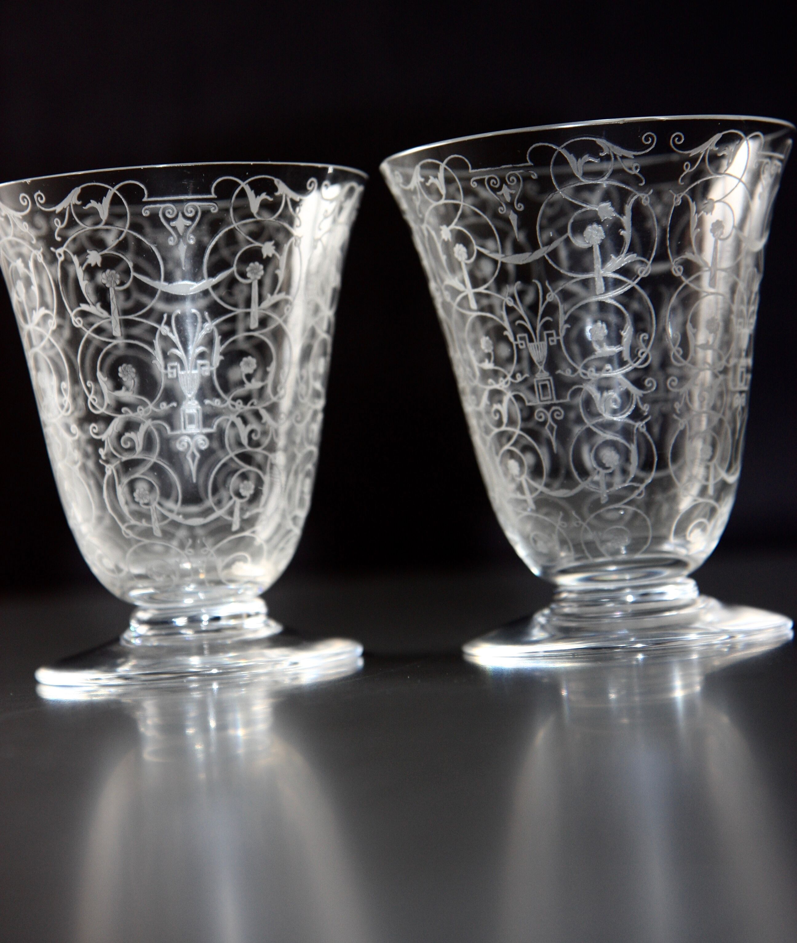 Two Baccarat glasses model "Michelangelo" in engraved crystal.