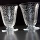 Two Baccarat glasses model "Michelangelo" in engraved crystal.