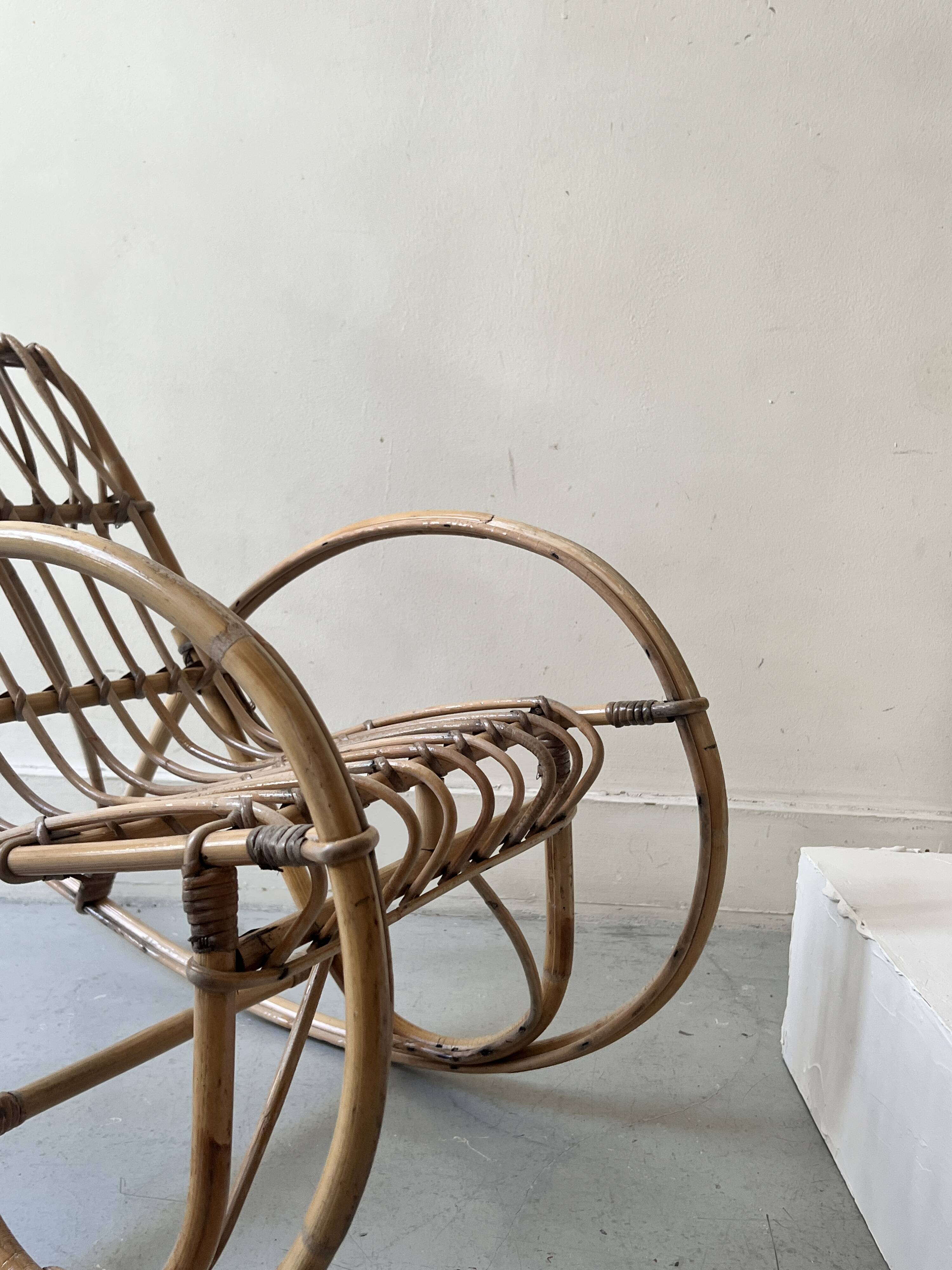 Child's rocking chair in rattan/bamboo, France 1950.