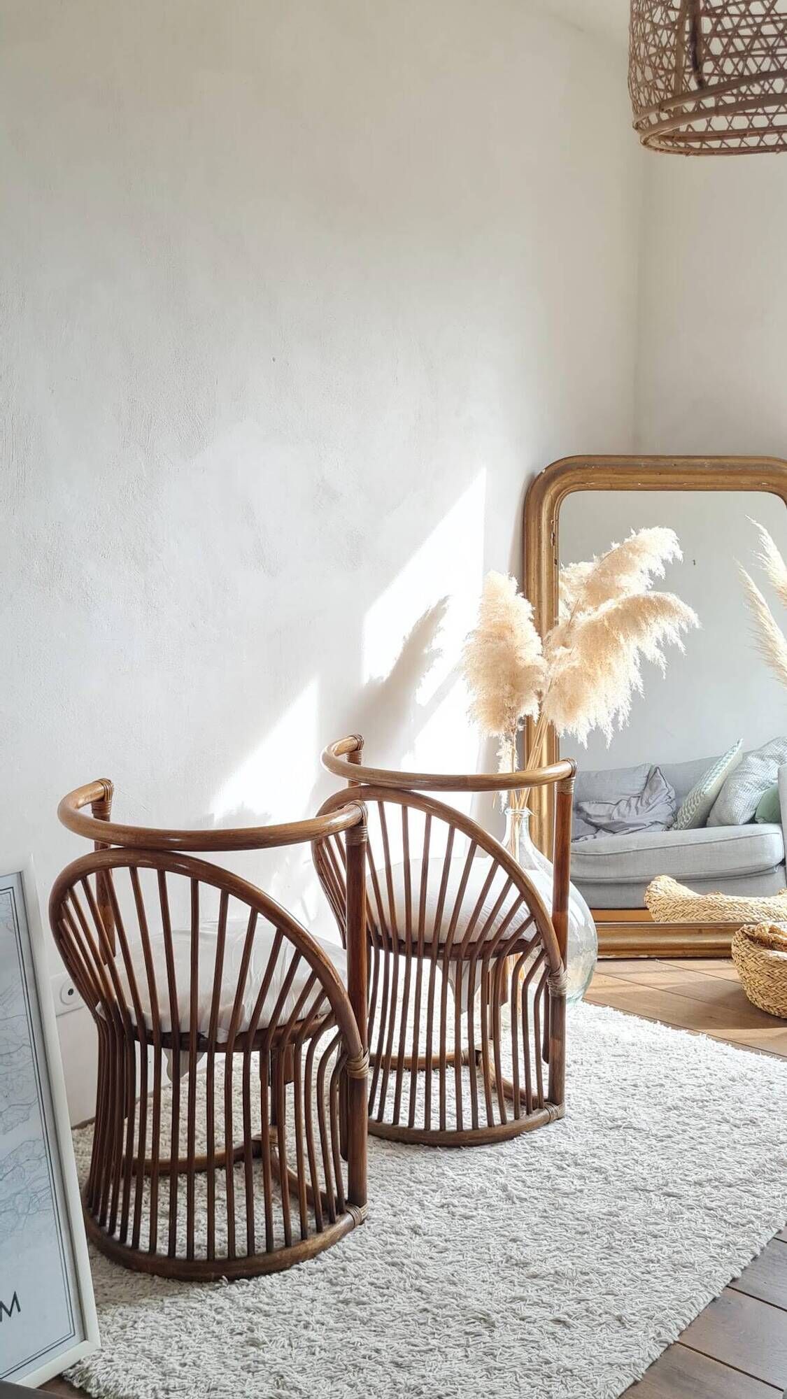 Pair of vintage rattan armchairs circa the 1960s.