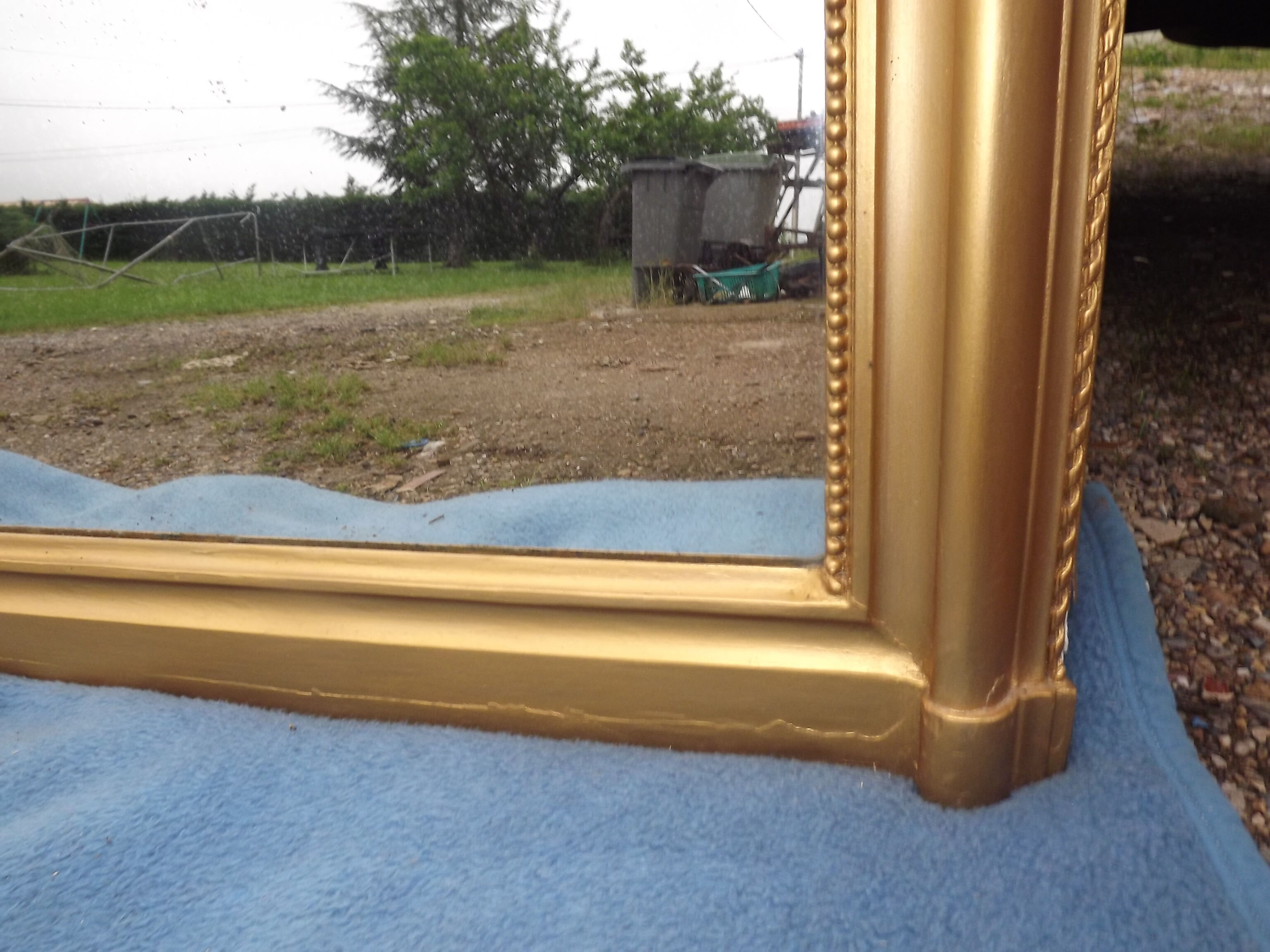 Golden mirror XlXth wood and stuk