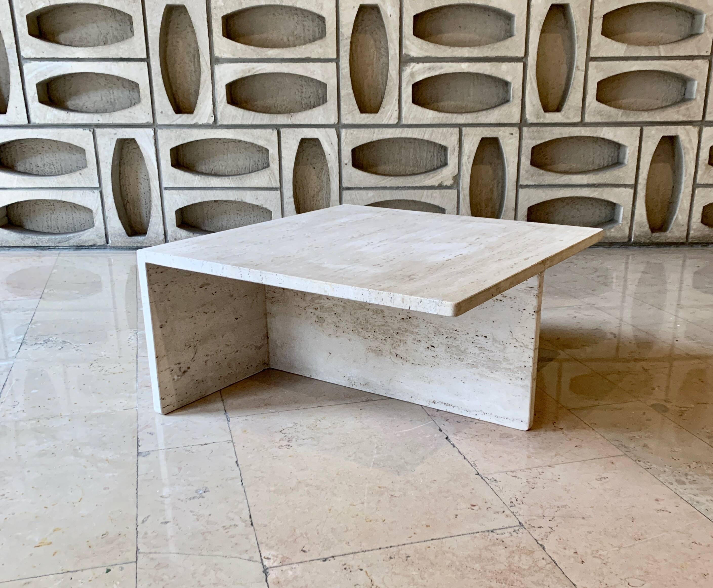 Square travertine coffee table by Giusti and Di Rosa for UP&UP.
