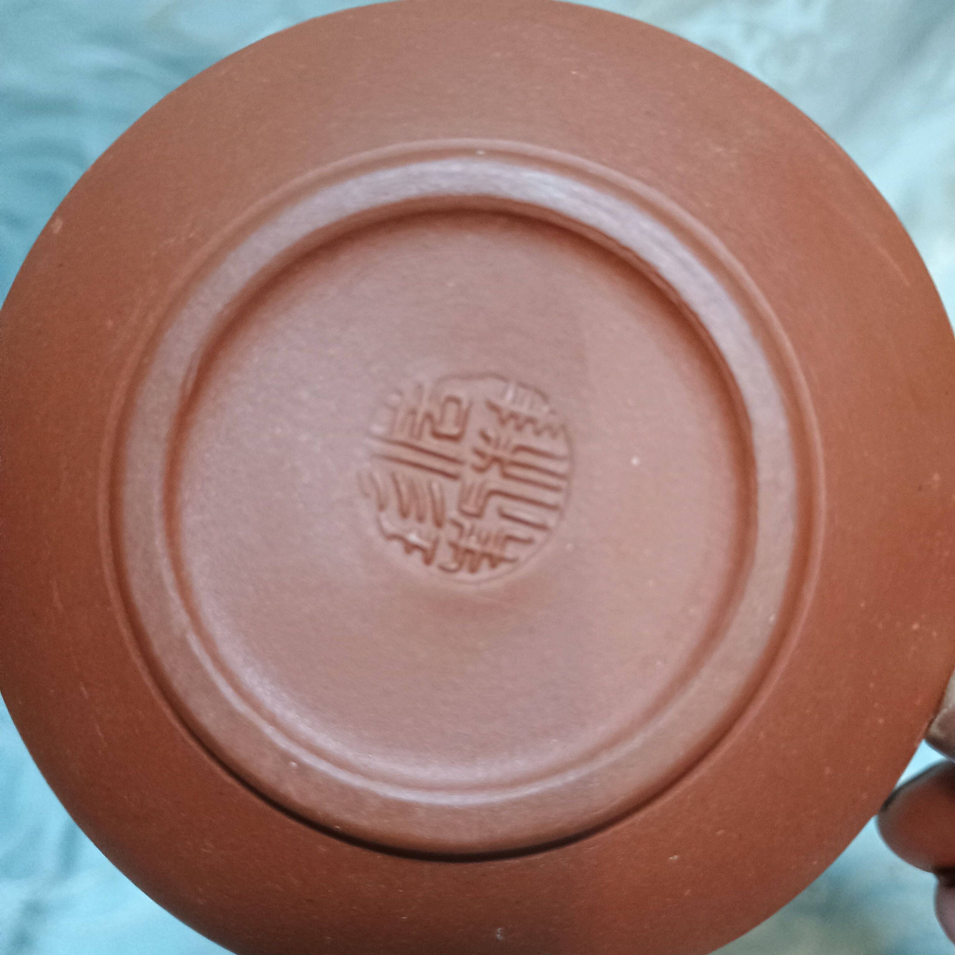 Yixing teapot in signed red clay
