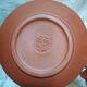 Yixing teapot in signed red clay