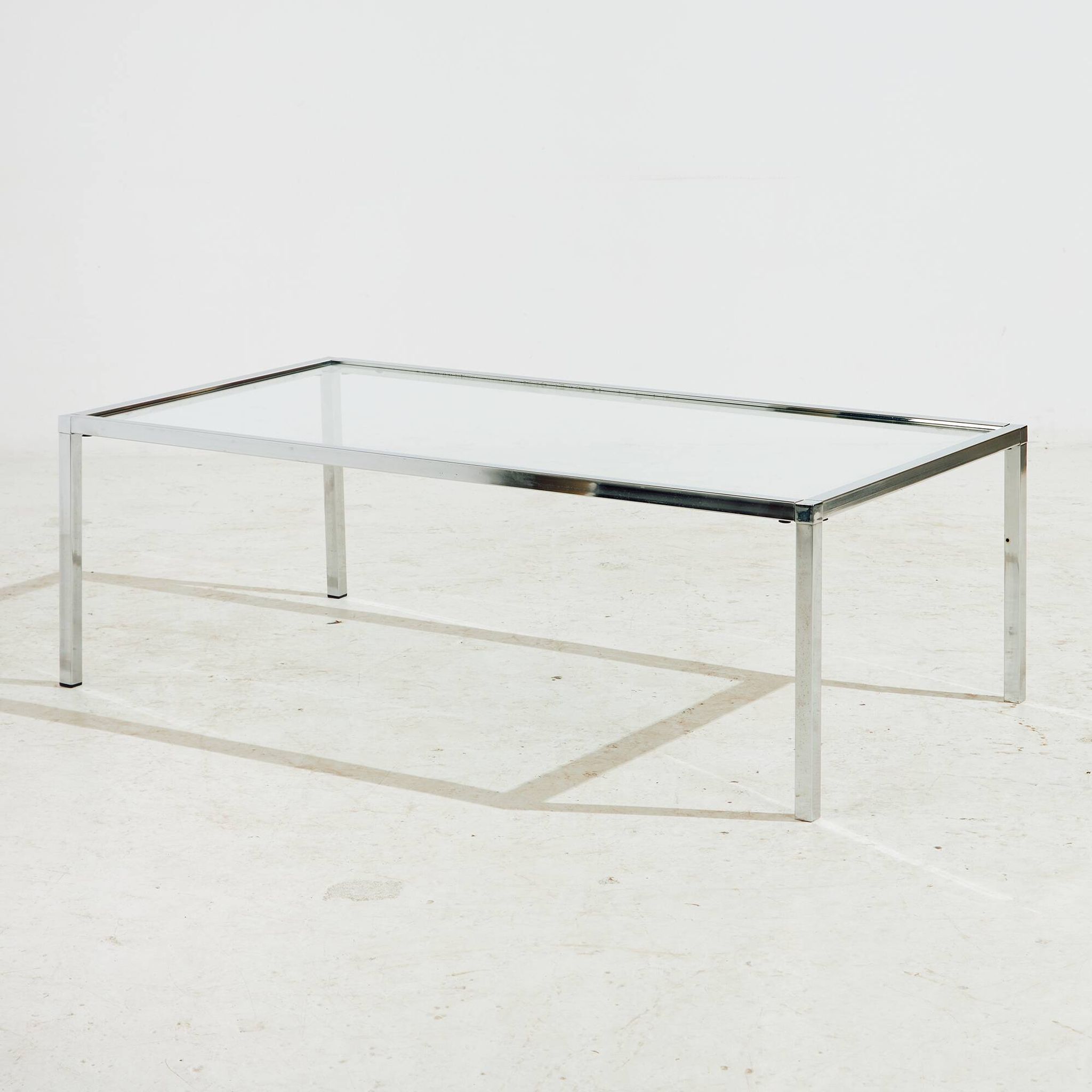 Chrome and glass coffee table.