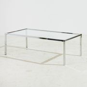 Chrome and glass coffee table.