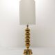 Scandinavian lamp base in gilded brass, ball model, Enco, circa 1960.