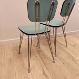 Pair of green Formica chairs with Eiffel legs
