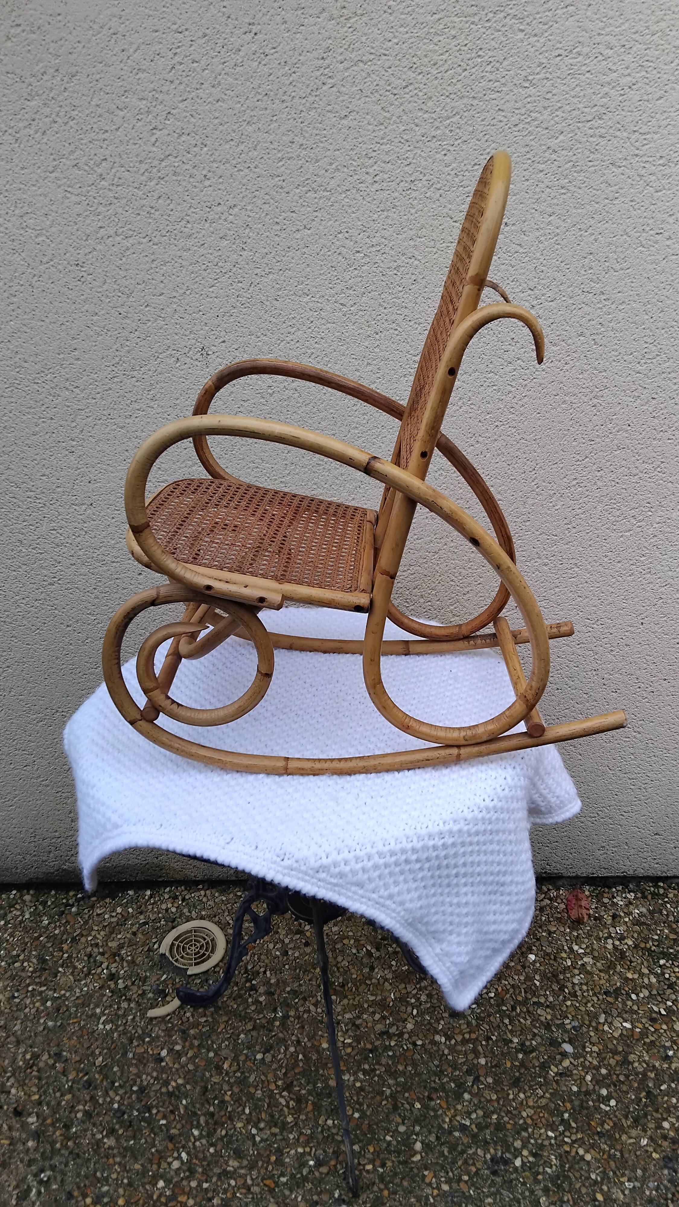 Vintage rattan and bamboo children's rocking chair