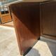 Modernist desk in wood and green moleskin upholstery