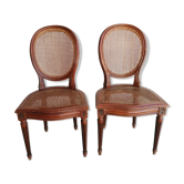 Paire de chaises médaillon de style Louis XVI cannées vintage