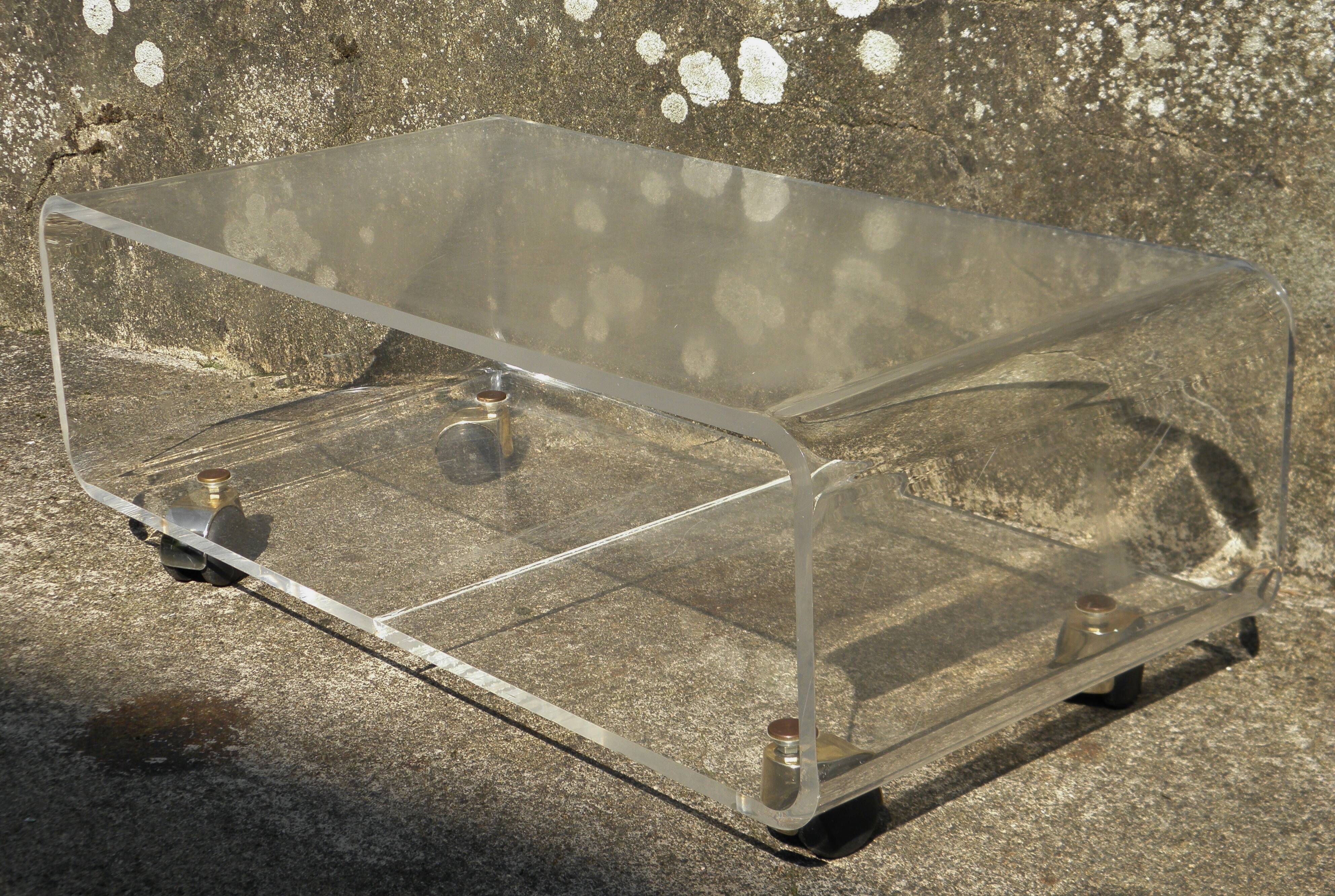 Plexiglass coffee table on wheels