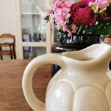 Enamelled ball pitcher