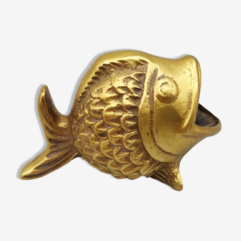 Old brass ashtray in the shape of a fish