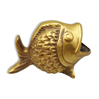 Old brass ashtray in the shape of a fish
