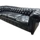 Large and old four-seater leather chesterfield sofa early 20th century l 260 cm