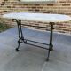 Bistro table in cast iron and marble from the art nouveau period.
