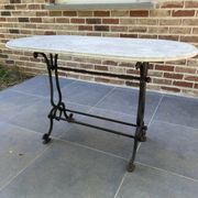 Art Nouveau cast iron and marble bistro table.