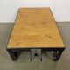 Table basse industrielle noire sur roulettes, années 1960