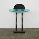 Artisanal wrought iron and cast glass leaning console table