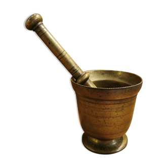Old mortar and brass pestle