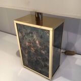 Lamp in gilded metal and stylized glass. In the style of Aldo Tura