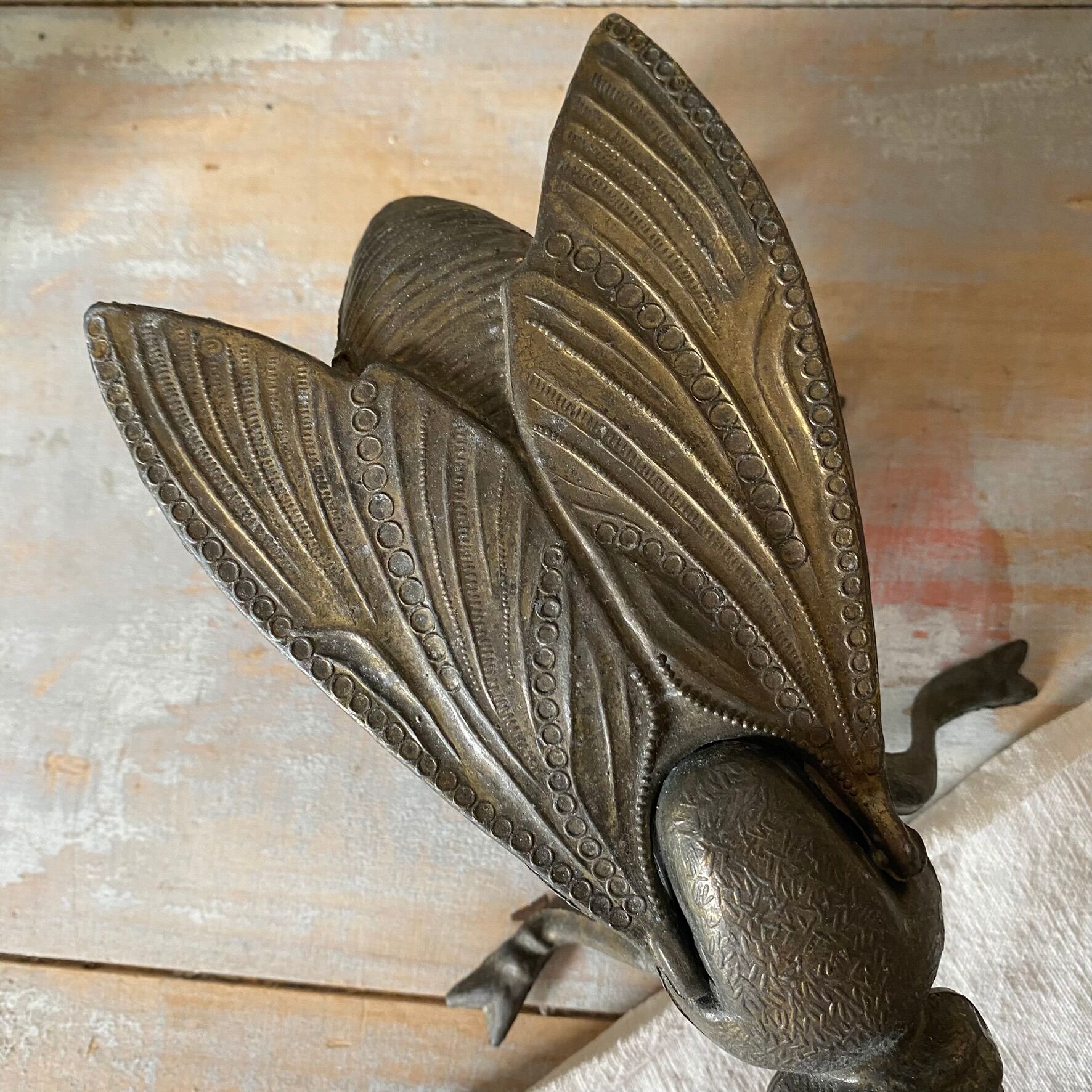 2 metal ashtrays with insect fly designs from the 1950s-60s.