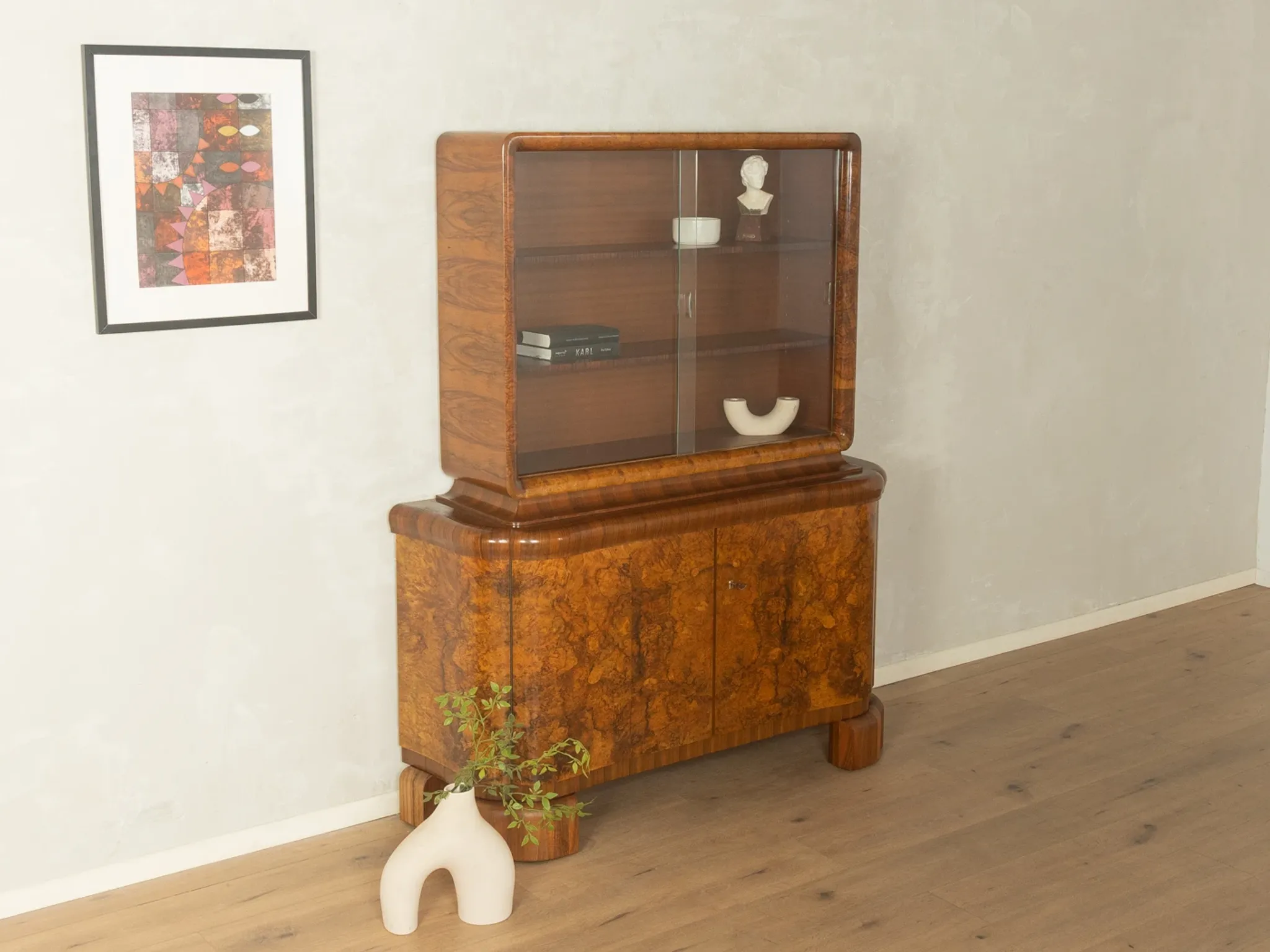Classic two-piece Art Deco display cabinet from the 1930s with striking burl wood veneer
