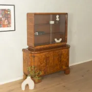 Classic two-piece Art Deco display cabinet from the 1930s with striking burl wood veneer