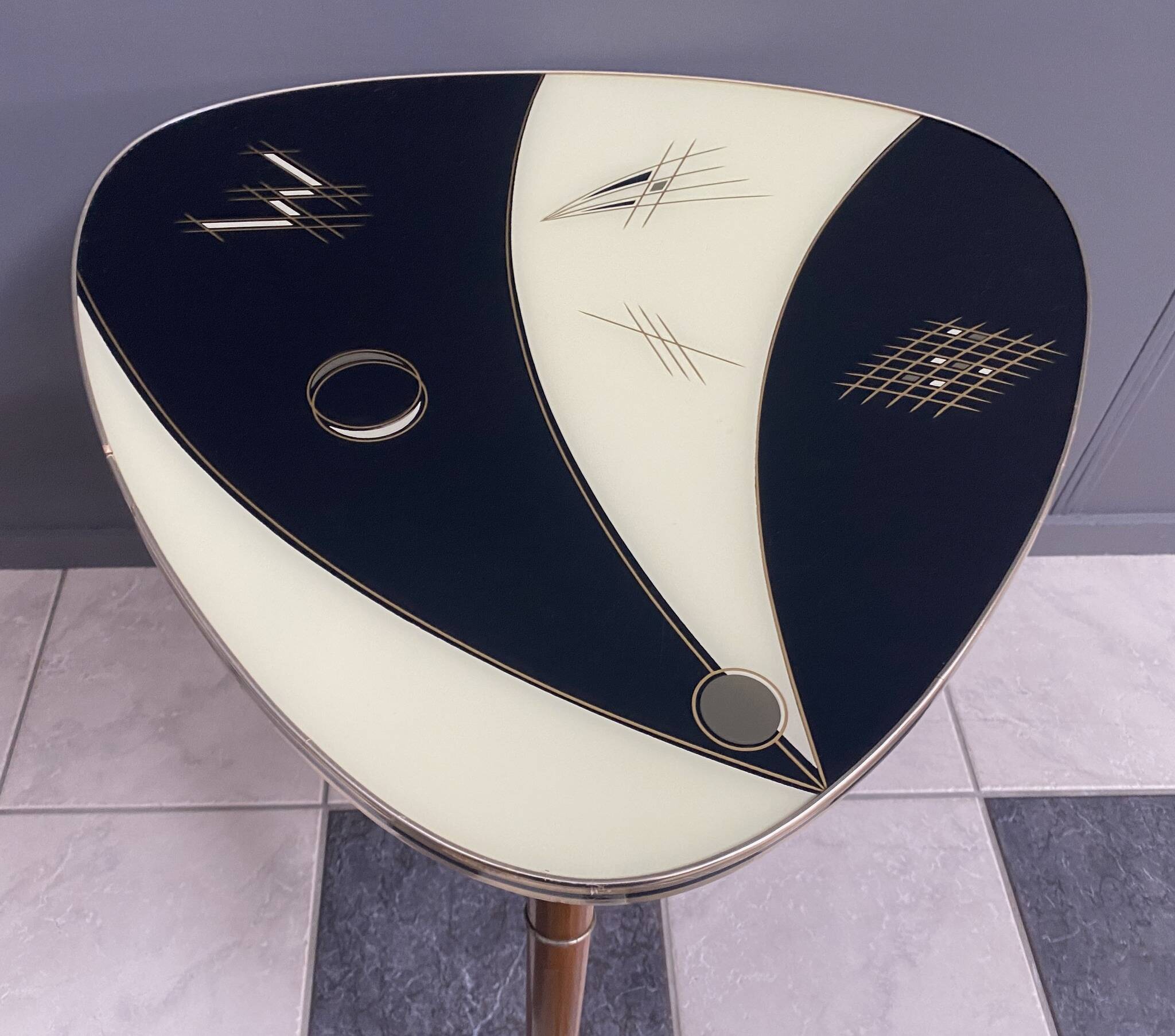 Triangular glass table from the 1960s
