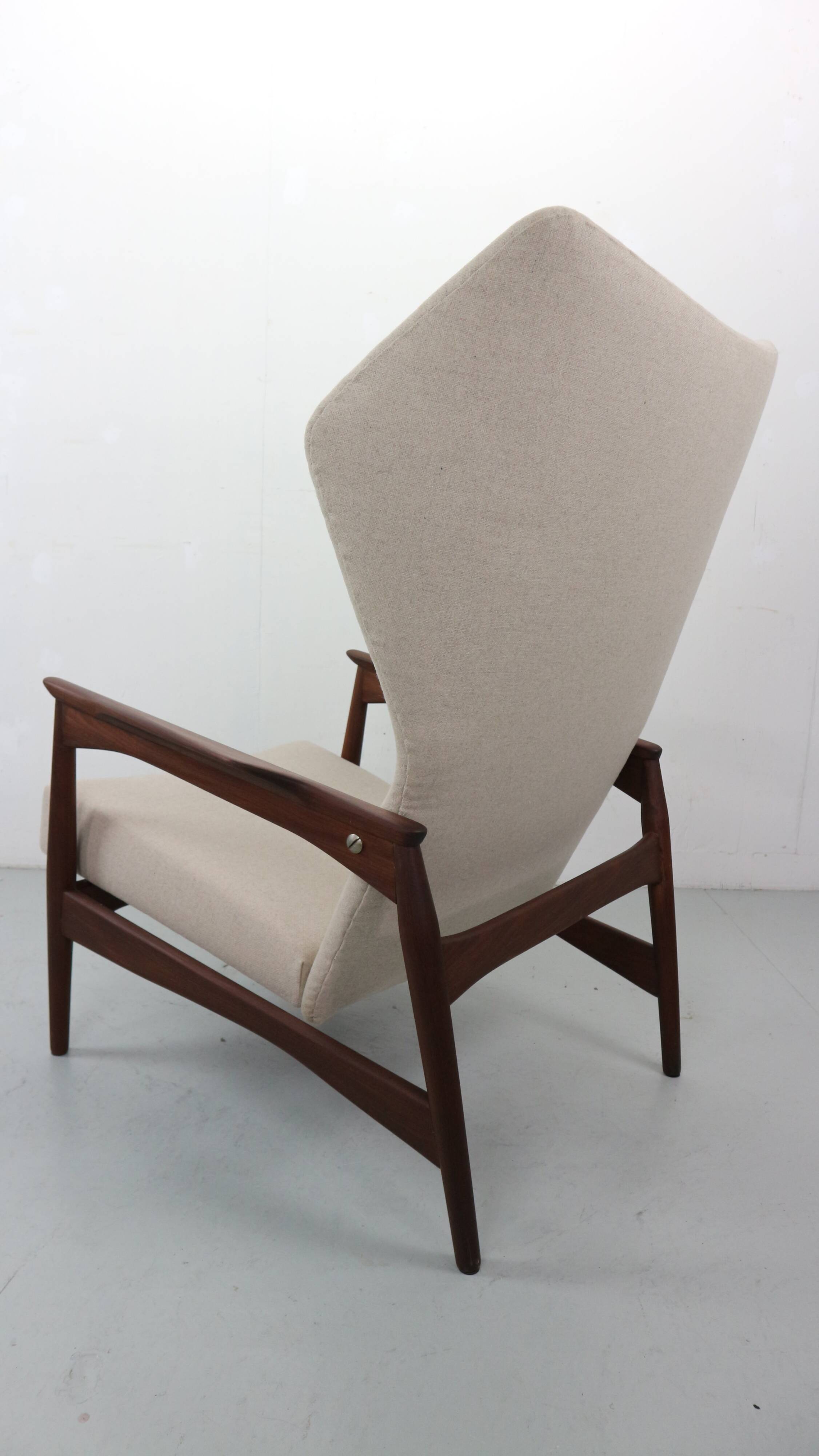 Danish adjustable wingback lounge chair in teak by Ib Kofod Larsen