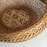 Braces of wood and woven rattan oval basket