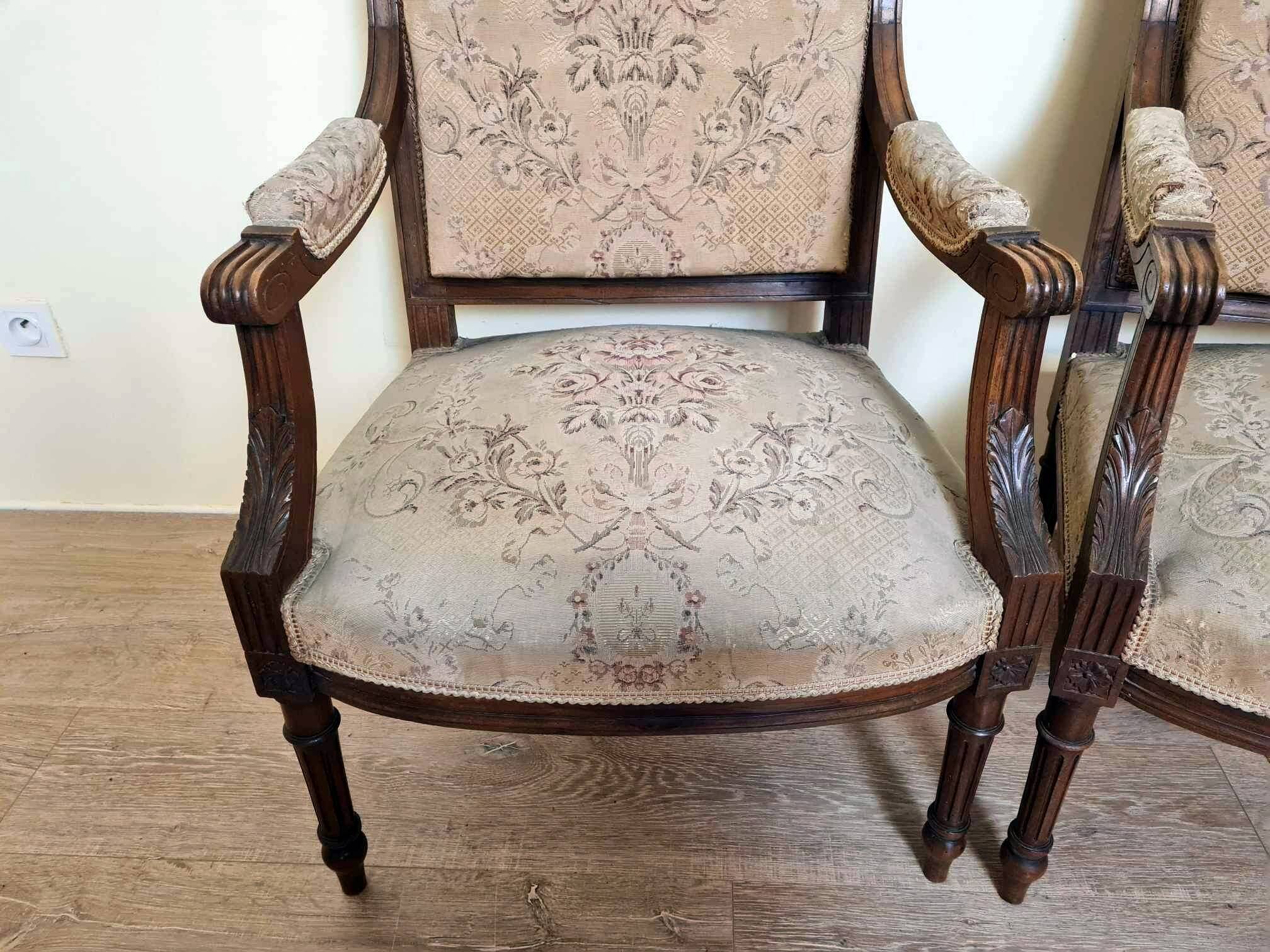 Pair of Louis XVI style queen-style armchairs in richly carved wood