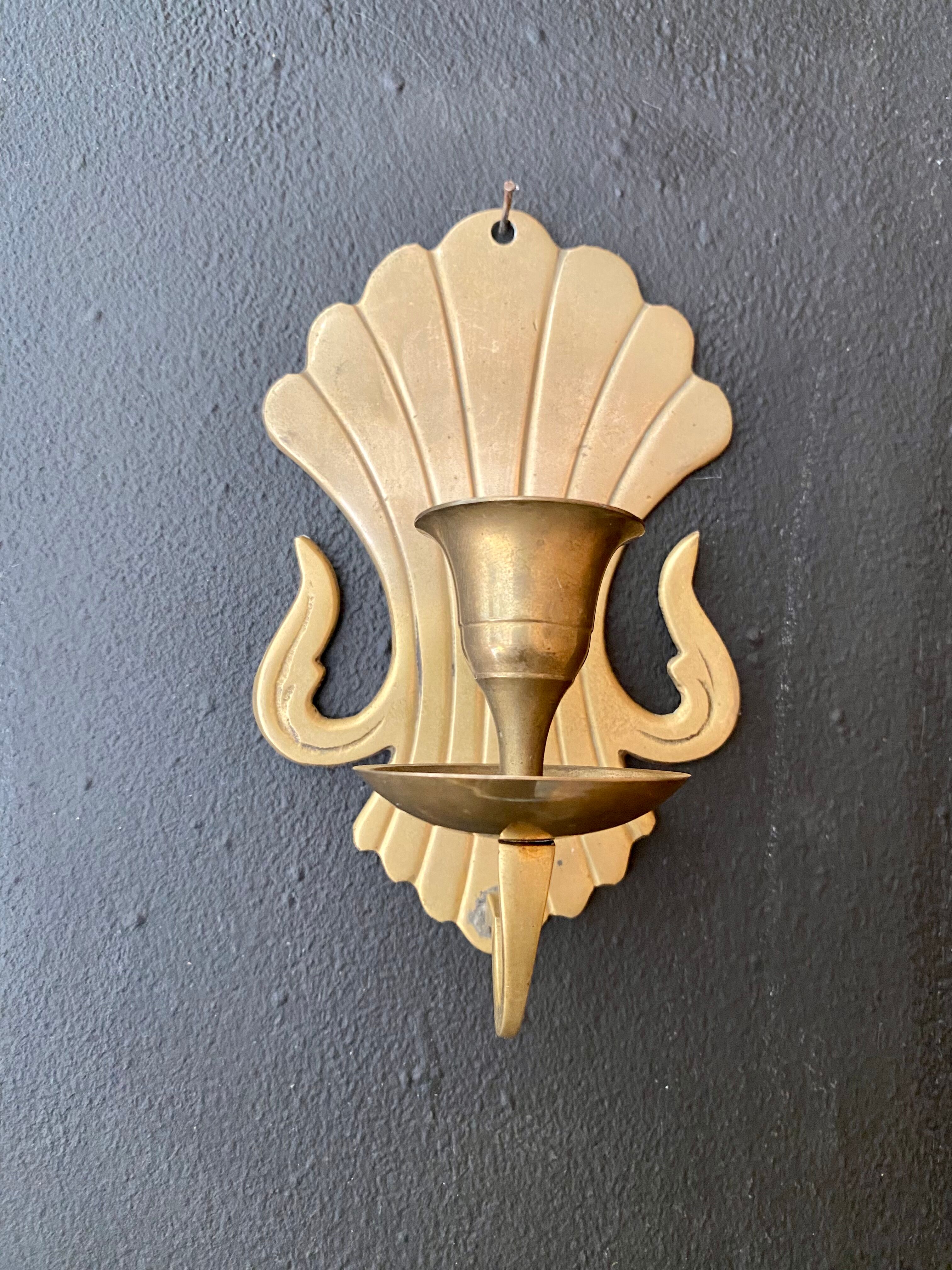 Pair of brass wall candle holders
