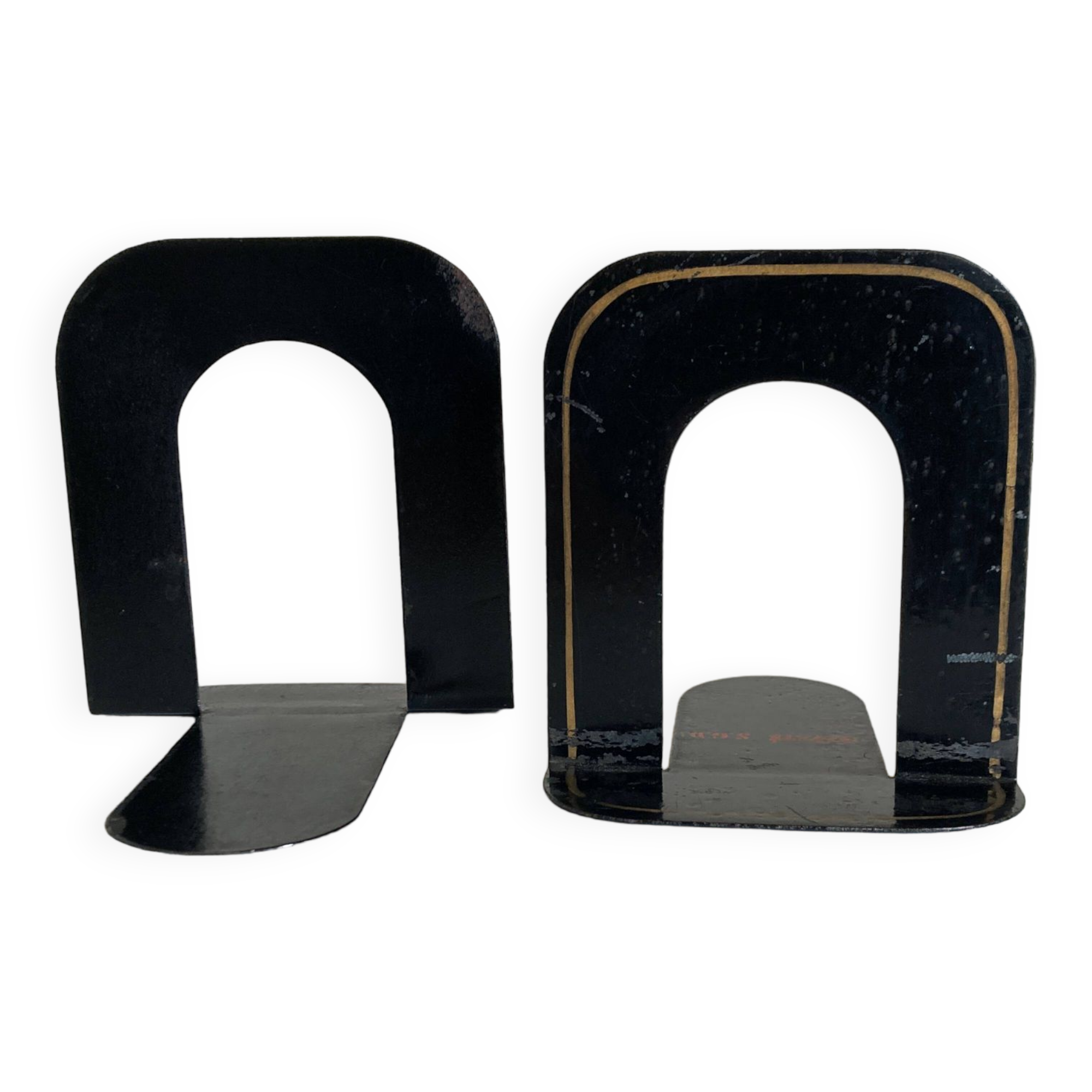 Pair of heavy metal bookends, folded, 1920.