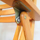 Paire de fauteuils pliants en bois vernis signé Clairitex