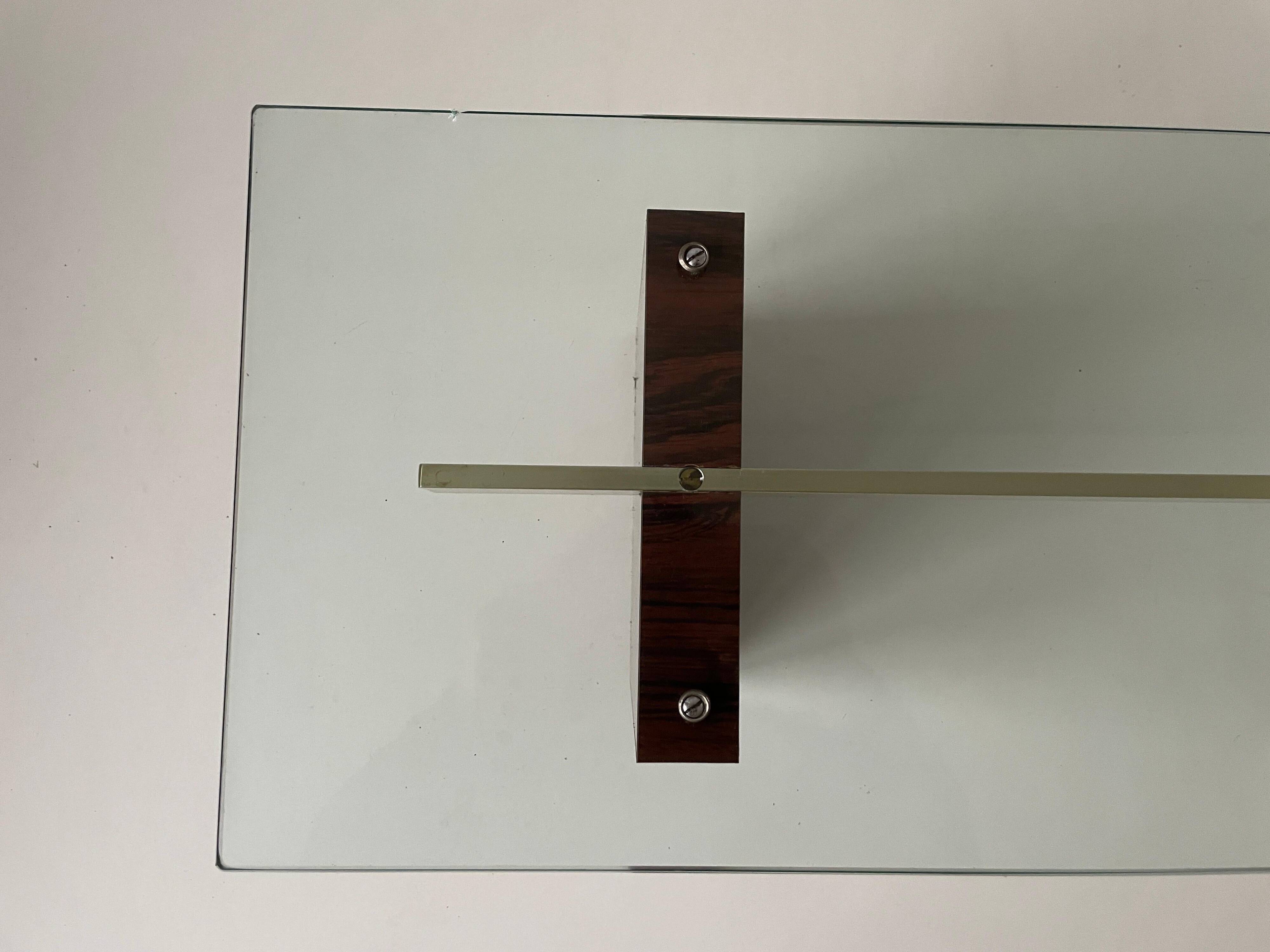 Mid-century minimalist thick glass coffee table, rosewood legs, 1960, Germany.